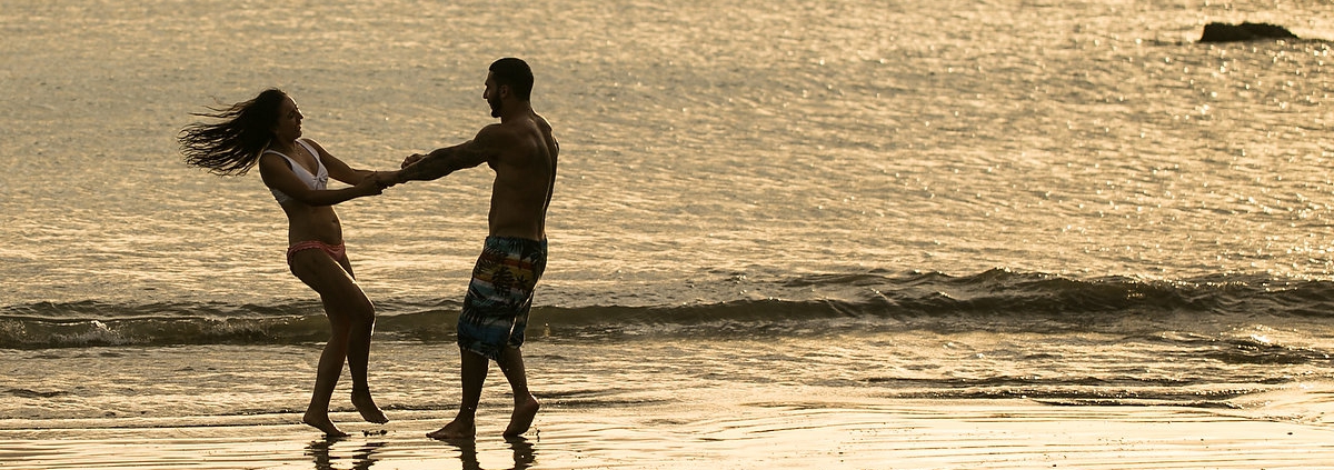 Lovers at sunset Dreams Las Mareas Beach Portrait photo