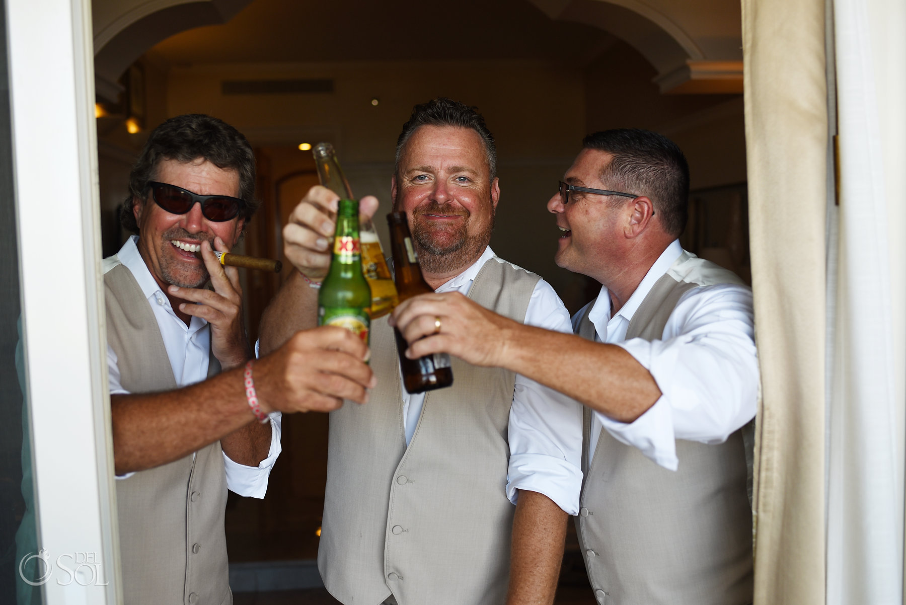 fun groomsmen photo beer toast Iberostar Grand Paraiso Wedding