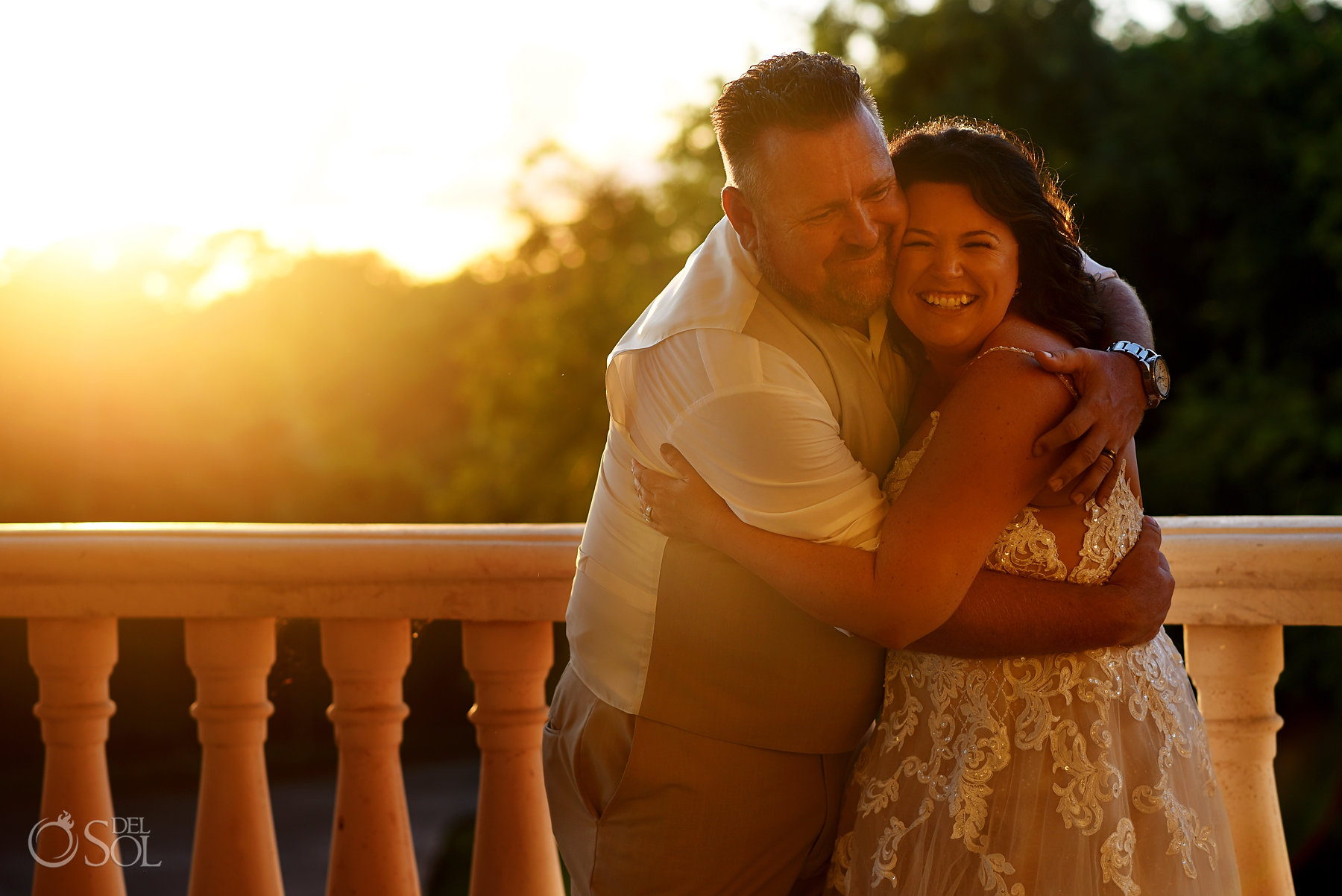 happy bride and groom hugging Iberostar Grand Paraiso wedding