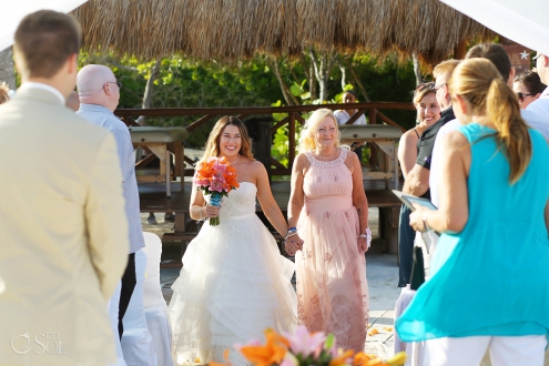 bride entrance with mom giving her away Iberostar Paraiso del Mar Wedding