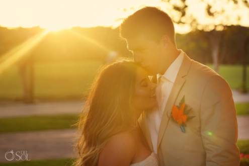 groom kisses bride on forhead perfect golden hour sunset portrait Iberostar Paraiso del Mar Wedding