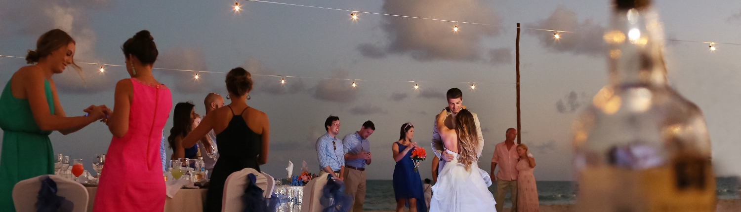 bruide and groom first dance Iberostar Paraiso del Mar Wedding reception at sunset