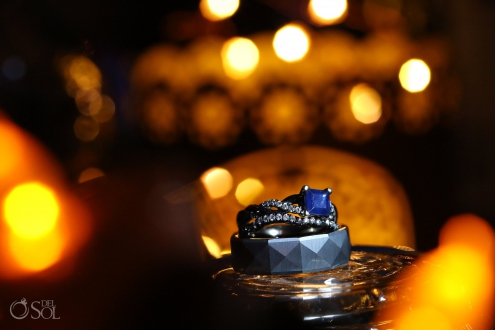 macro photograph of wedding bands and sapphire engagement ring Iberostar Paraiso del Mar Wedding cancun
