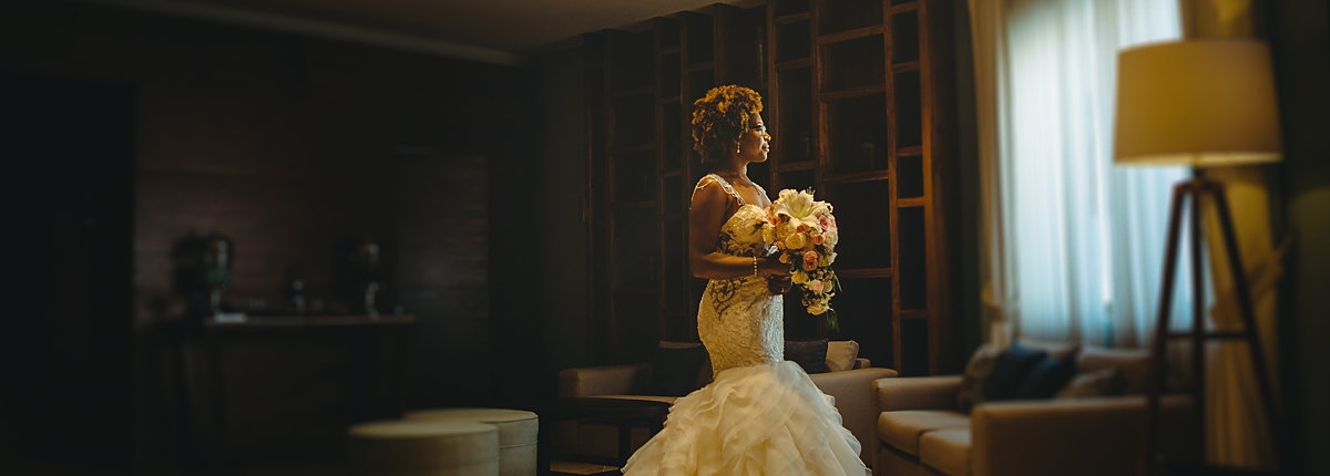 bridal portrait Afro bride wearing Eve of Milady wedding dress Hyatt Ziva Cancun