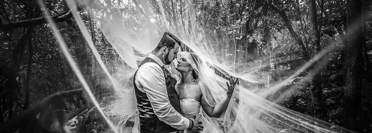 Dramatic black and white wedding portrait with long bridal veil Maggie Sottero Trash the Dress