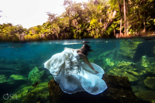beautiful bride looks like a water lily wearing Maggie Sottero Wedding dress underwater photo