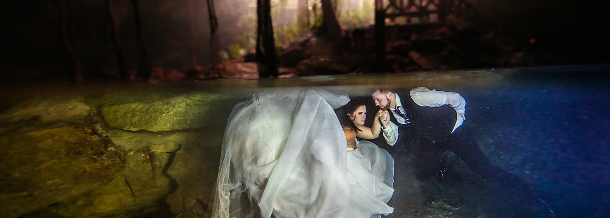 underwater wedding photo split shot cenote trash the dress riviera maya mexico
