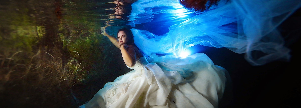 underwater bride wearing Maggie Sottero wedding dress bianca