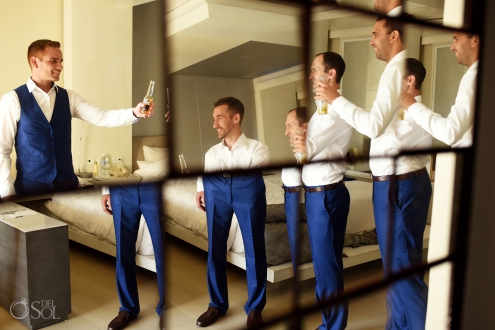 Getting Ready Groom Party Best man Corona Beer Toast Psychedelic Reflection Secrets Silversands Suit Cancun Wedding