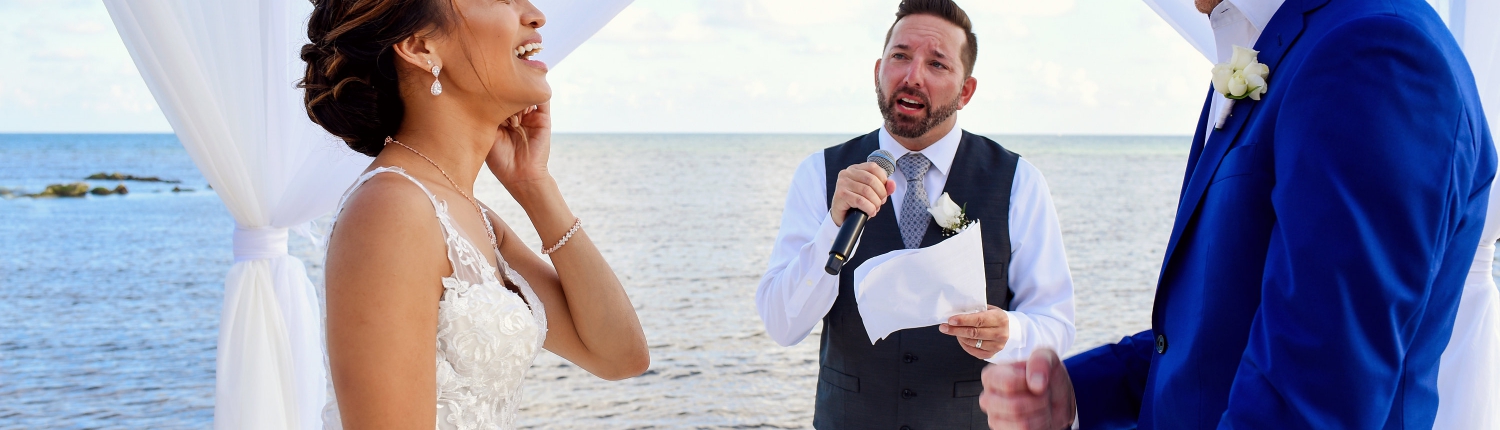 Funny Officiant Speech Romantic Beach Front Wedding Decoration Ceremony Estee Couture Bridal Dress Indochino Groom Suit