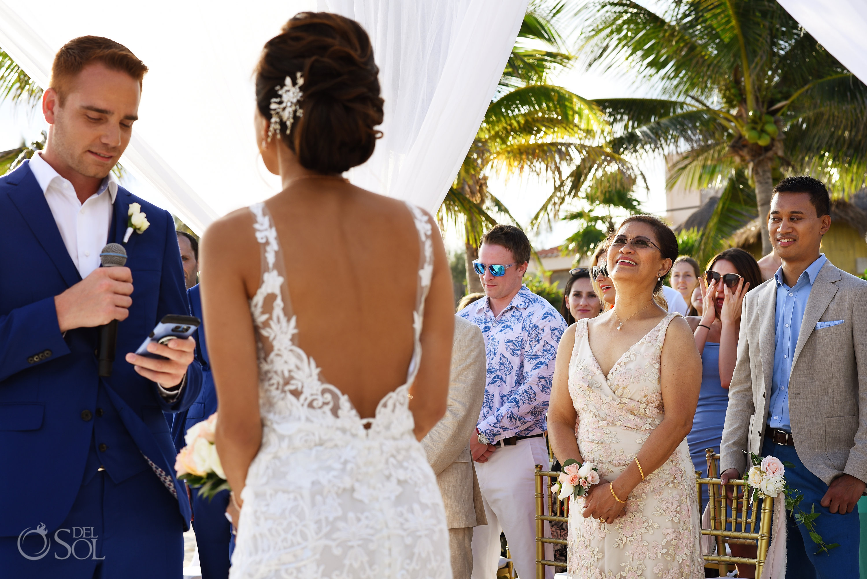 low-cut back Estee Couture bridal Dress Groom Vows Indochino mens deep blue suit Secrets Silversands Wedding Destination