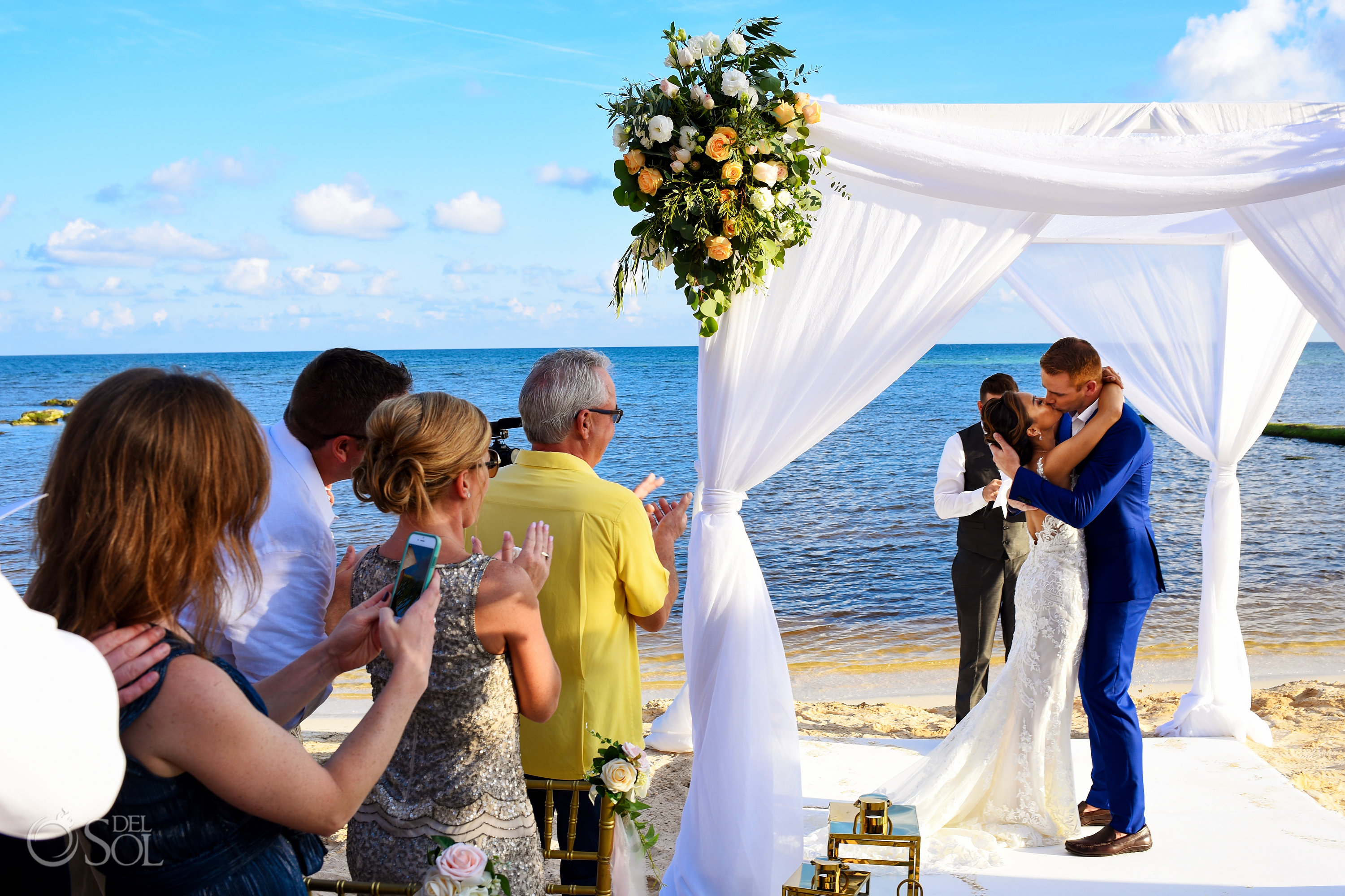First Kiss newlyweds Beach Front Secrets Silversands Wedding Decoration Ideas family Wedding Cancun