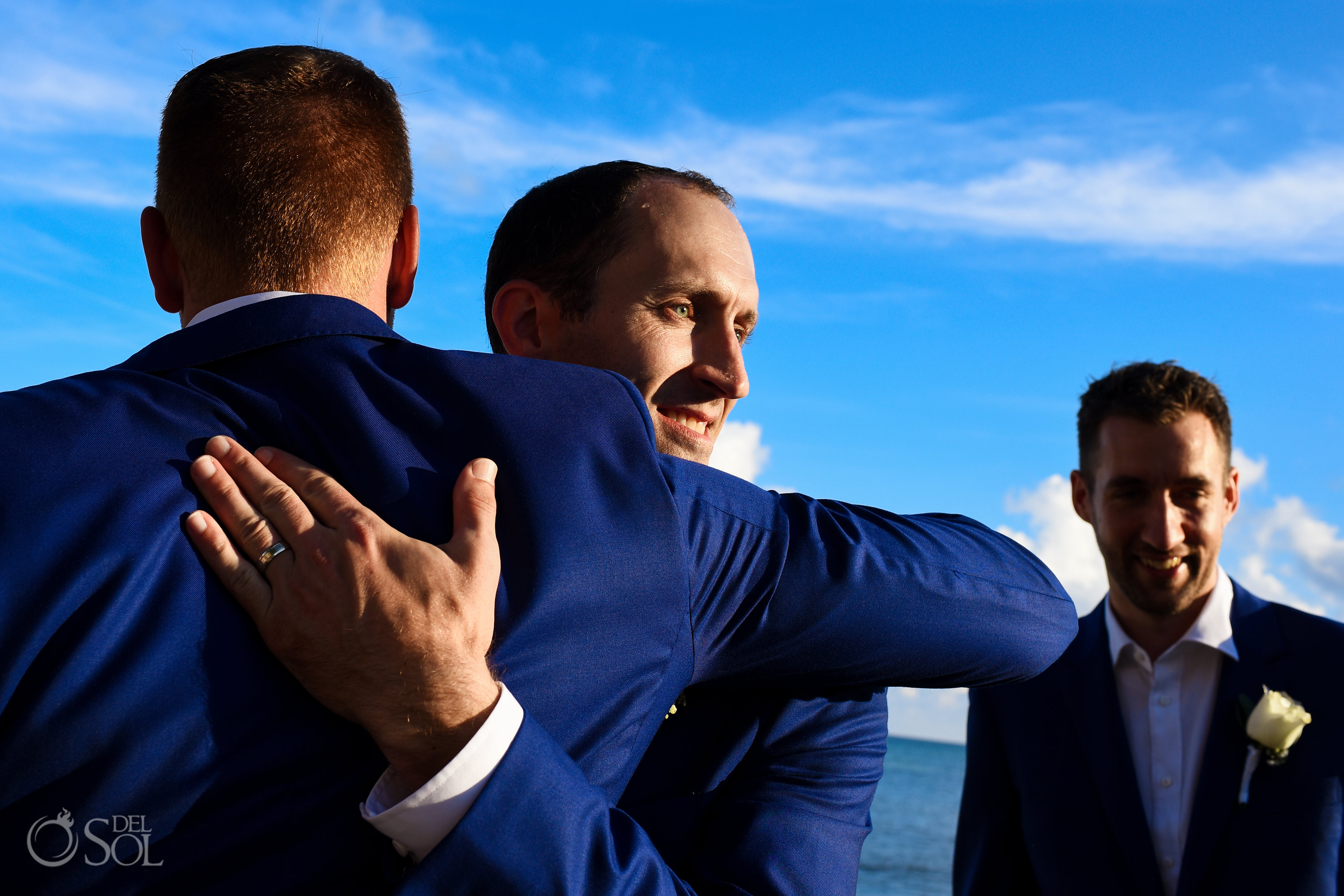 Best man Congratulations Hug Indochino Wedding Suit Deep Blue Model Secrets Silversands Cancun Wedding