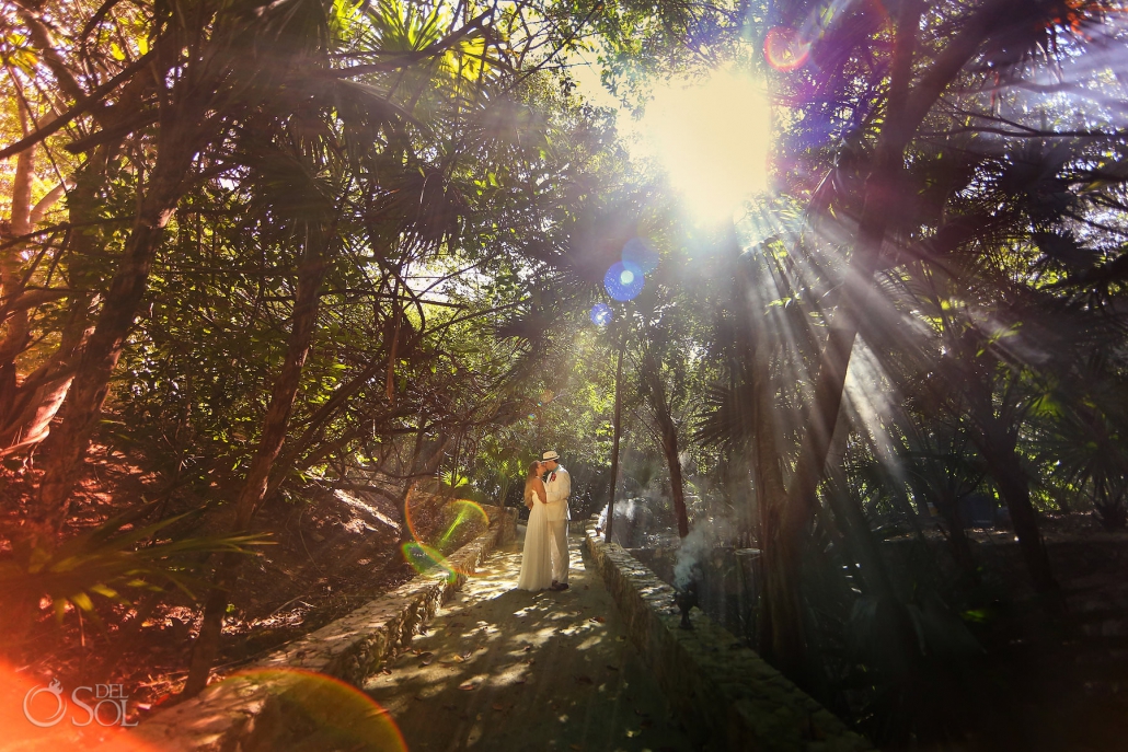Amazing wedding photograph lens flare jungle trash the dress