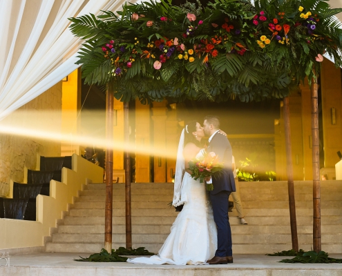first kiss Dreams Riviera Cancun staircase wedding ceremony