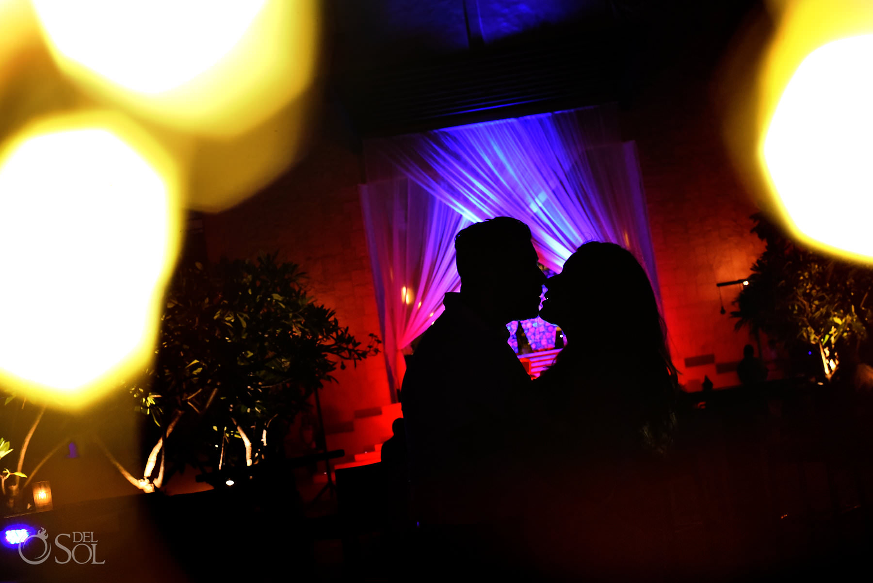 bride and groom silhouette night portrait Dreams Riviera Cancun wedding