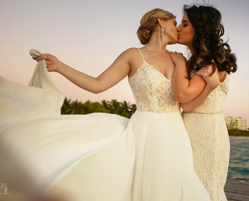 Homosexual Brides Kissing at Isla Mujeres lesbian wedding Zama Beach
