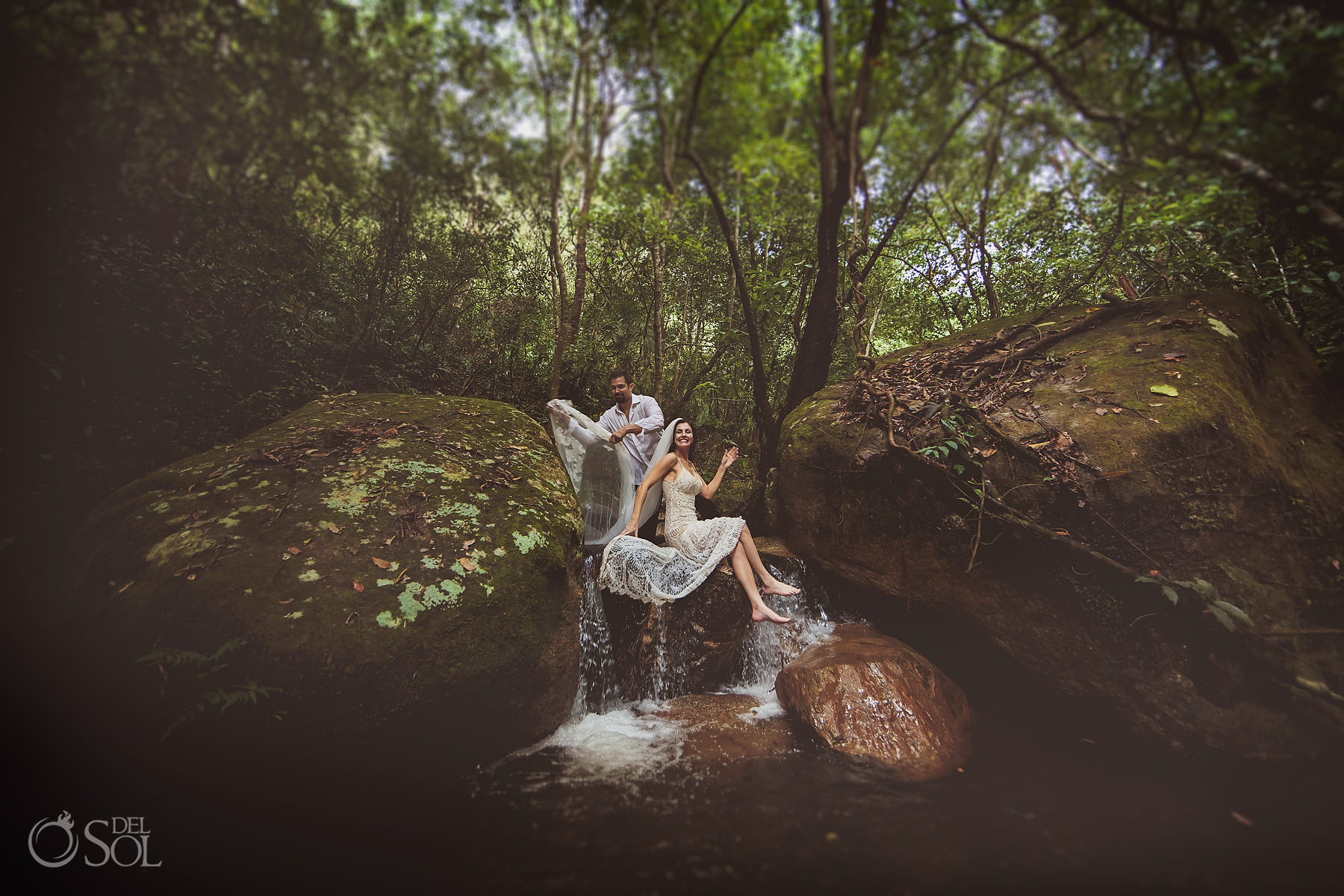 Puerto Vallarta trash the dress bride and groom crossing waterfall