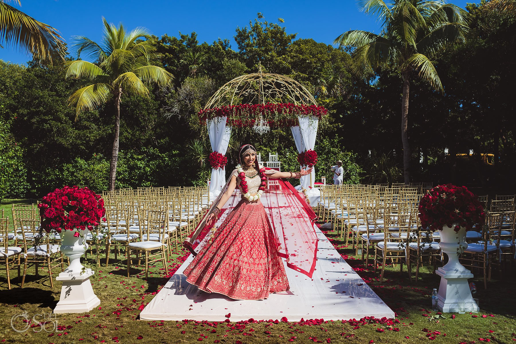 Hindu ceremony set up gold red Mandap Mexico South Asian Wedding Dreams Tulum Riviera Maya