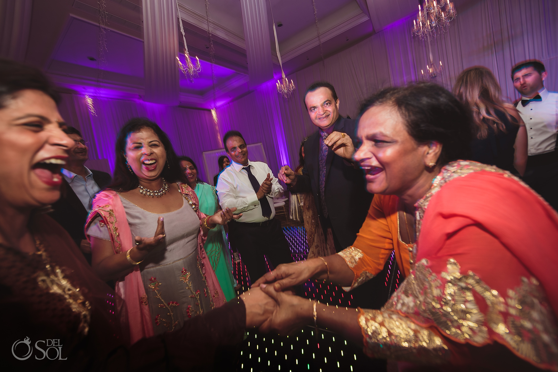 Indian family dancing at Dreams Tulum Jewish Wedding Reception