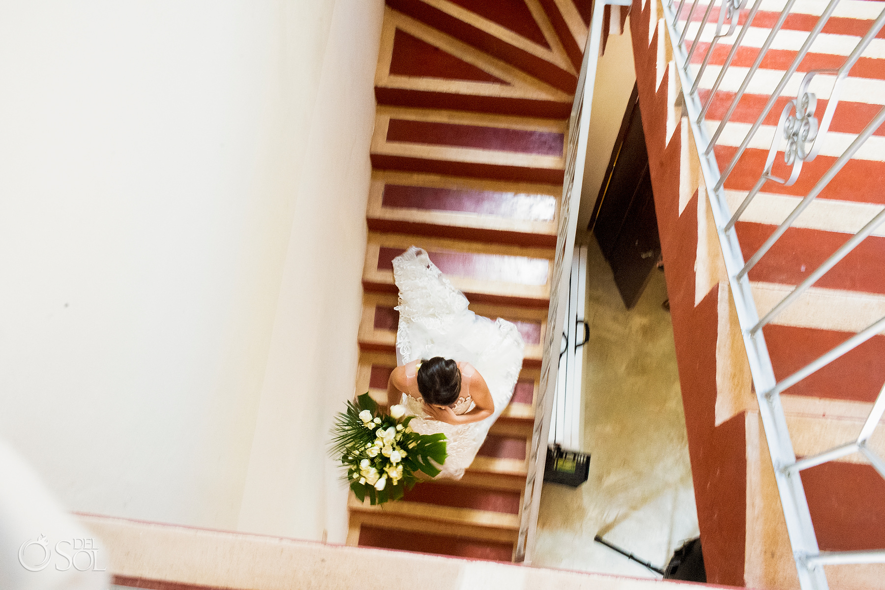 bride walking down stairs riviera maya villa wedding