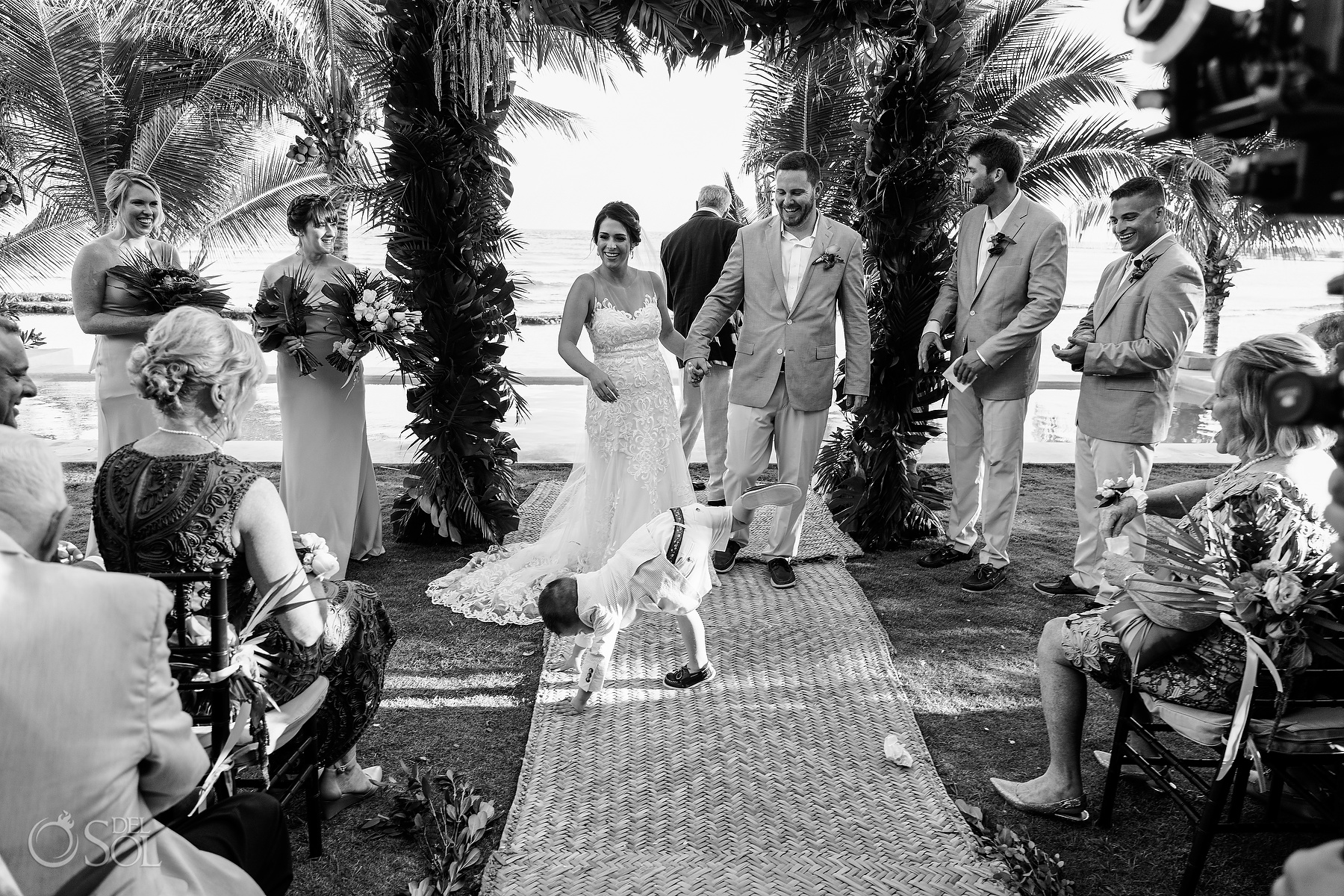 Just married walking out the Ceremony with son playing riviera maya villa wedding