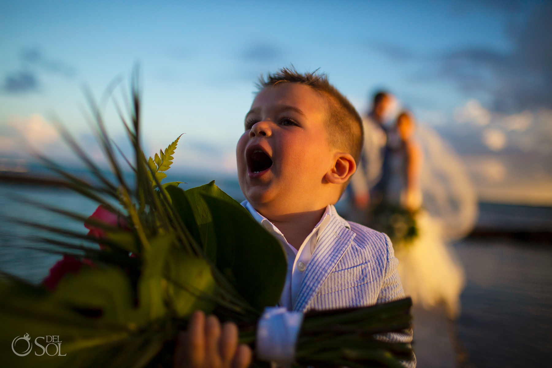 kid with bouquet golden hour just married riviera maya villa wedding