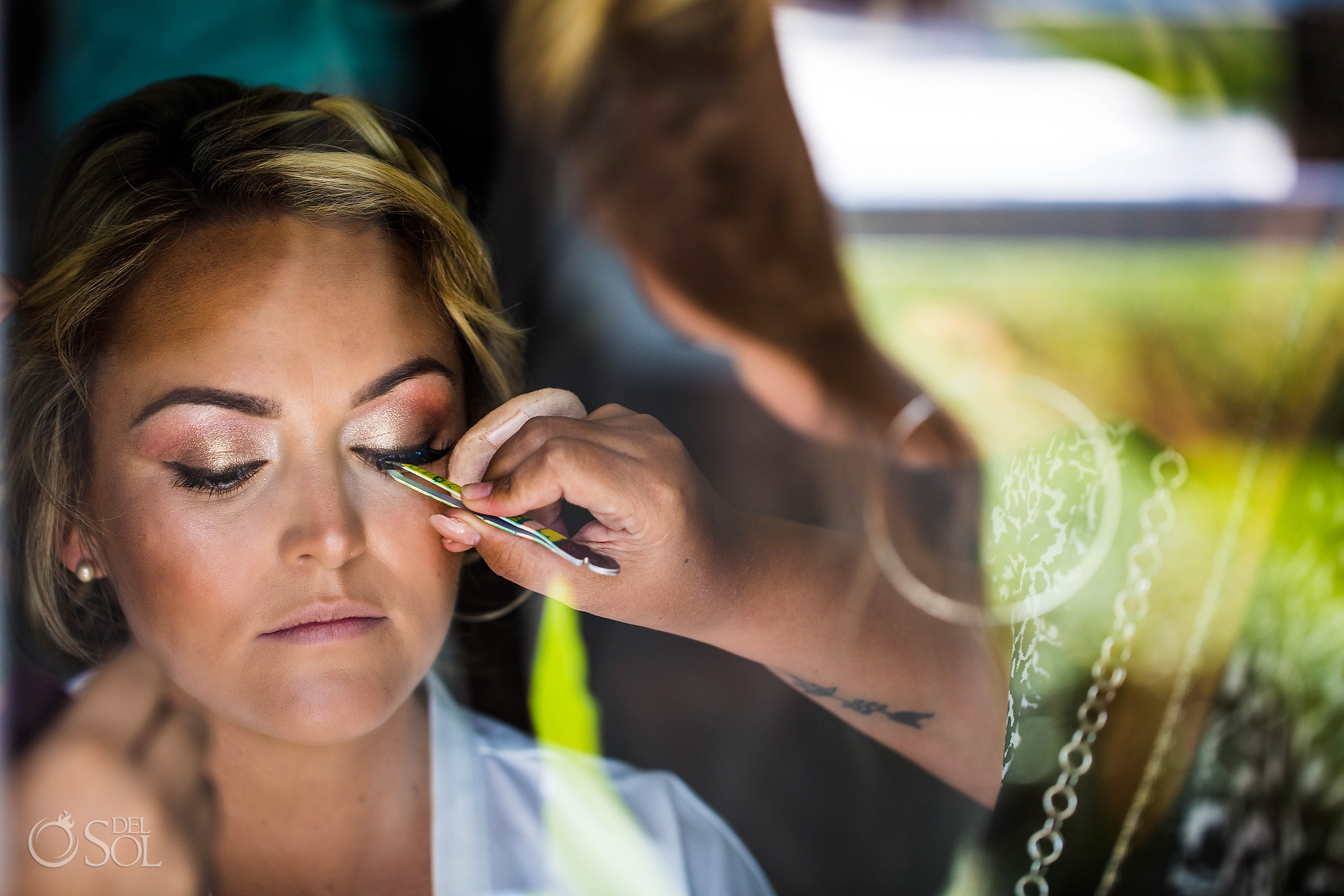Getting Ready Bridal Makeup with false eyelashes RIU PALACE Mexico wedding Photographer