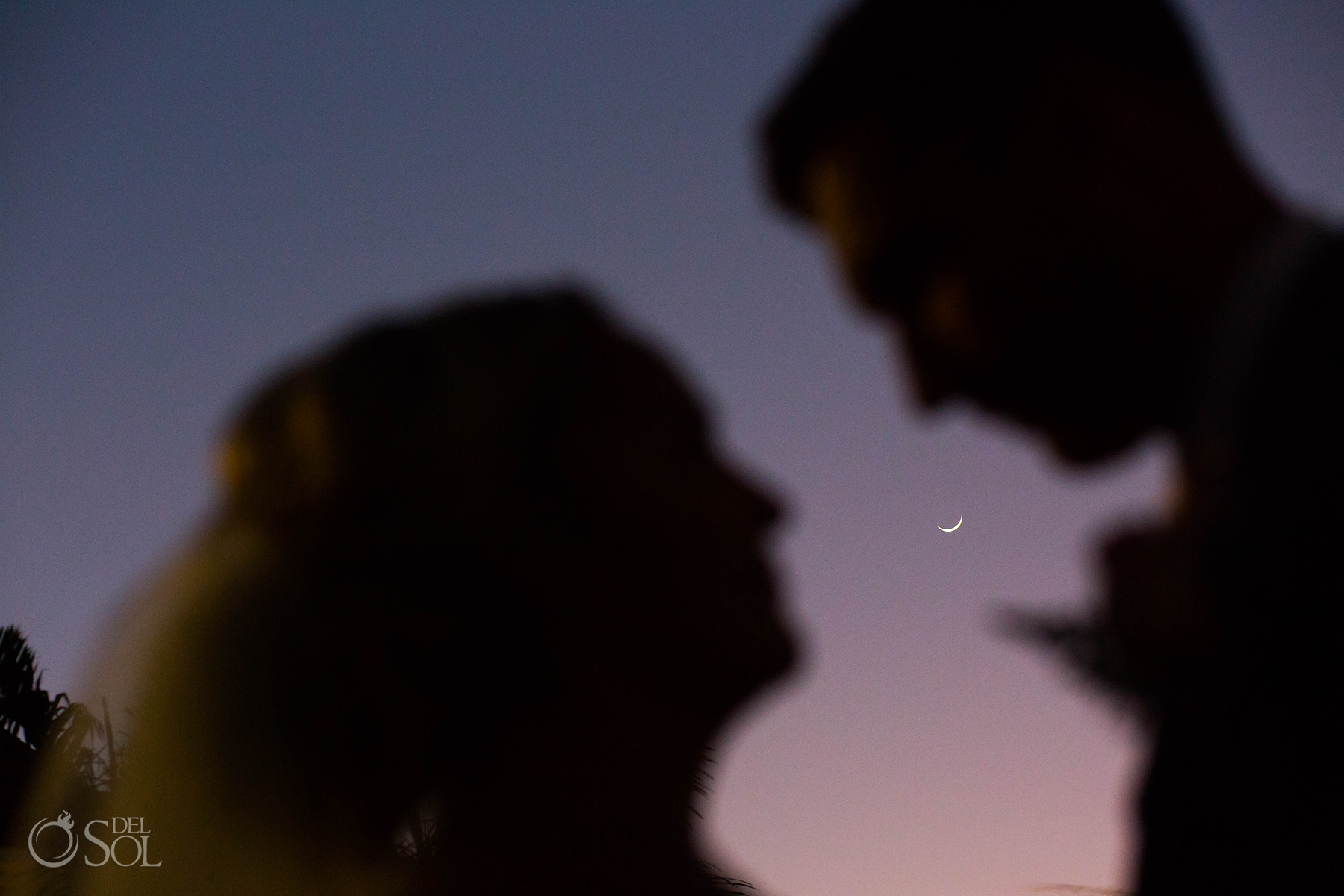 bride and groom with moon portrait