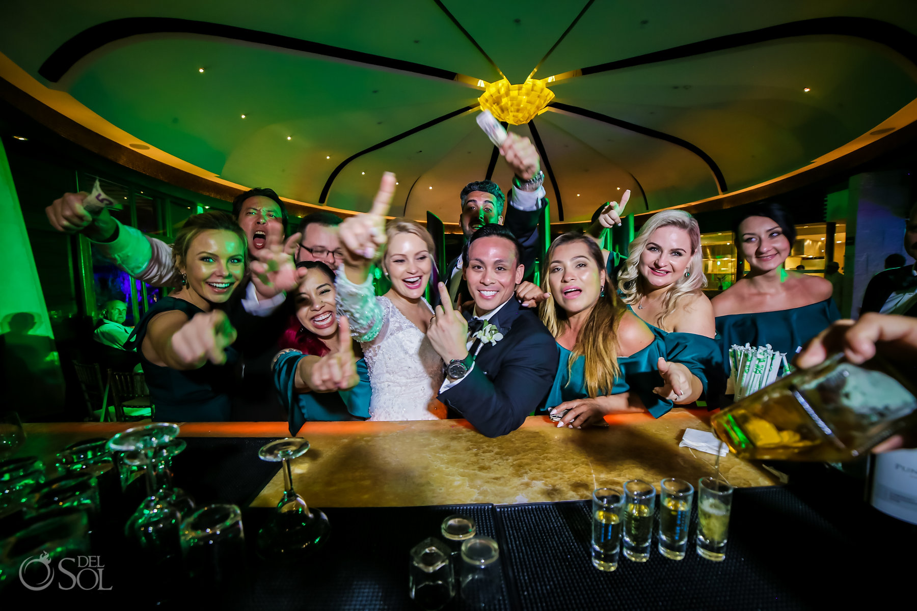 fun bridal party photo idea ordering tequila shots Restaurant Ambar blue diamond luxury boutique hotel