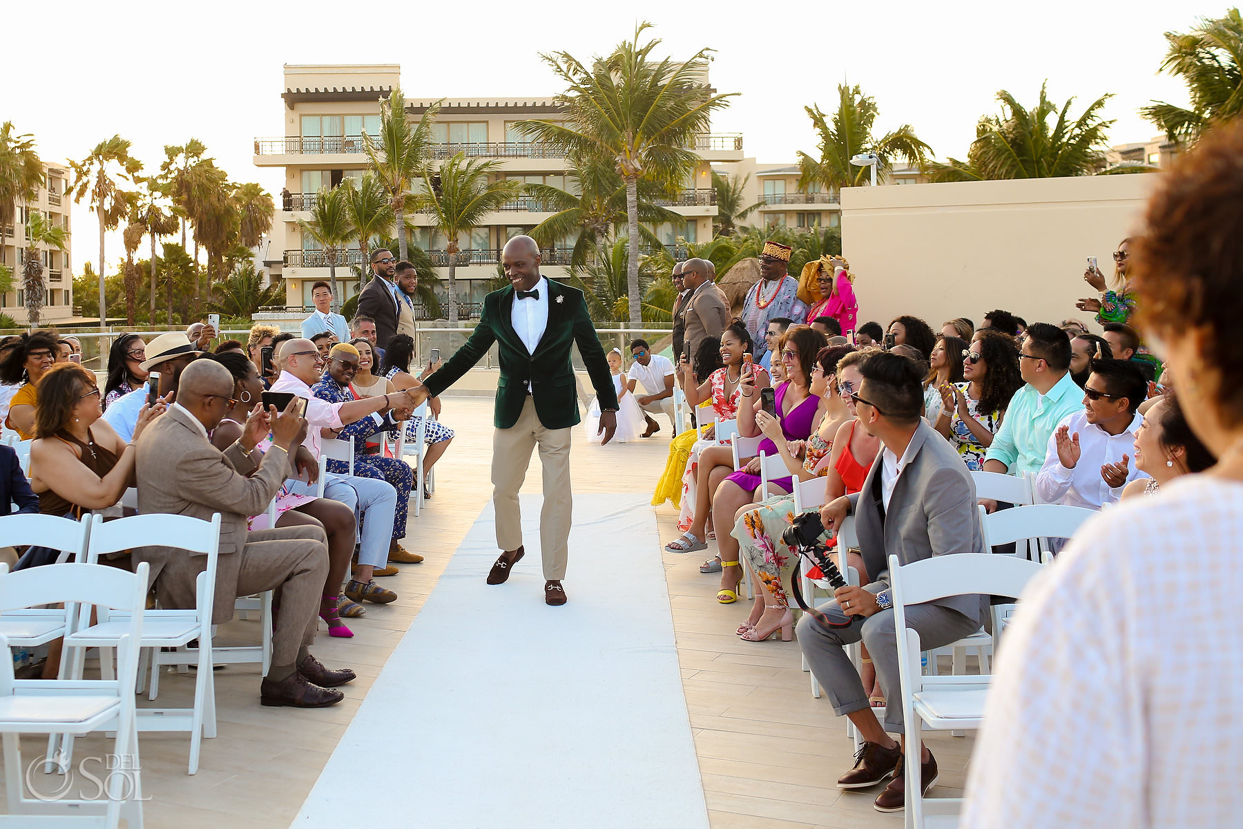 Best groom wedding entrance ideas high five Dreams Riviera Cancun terrace Mexico