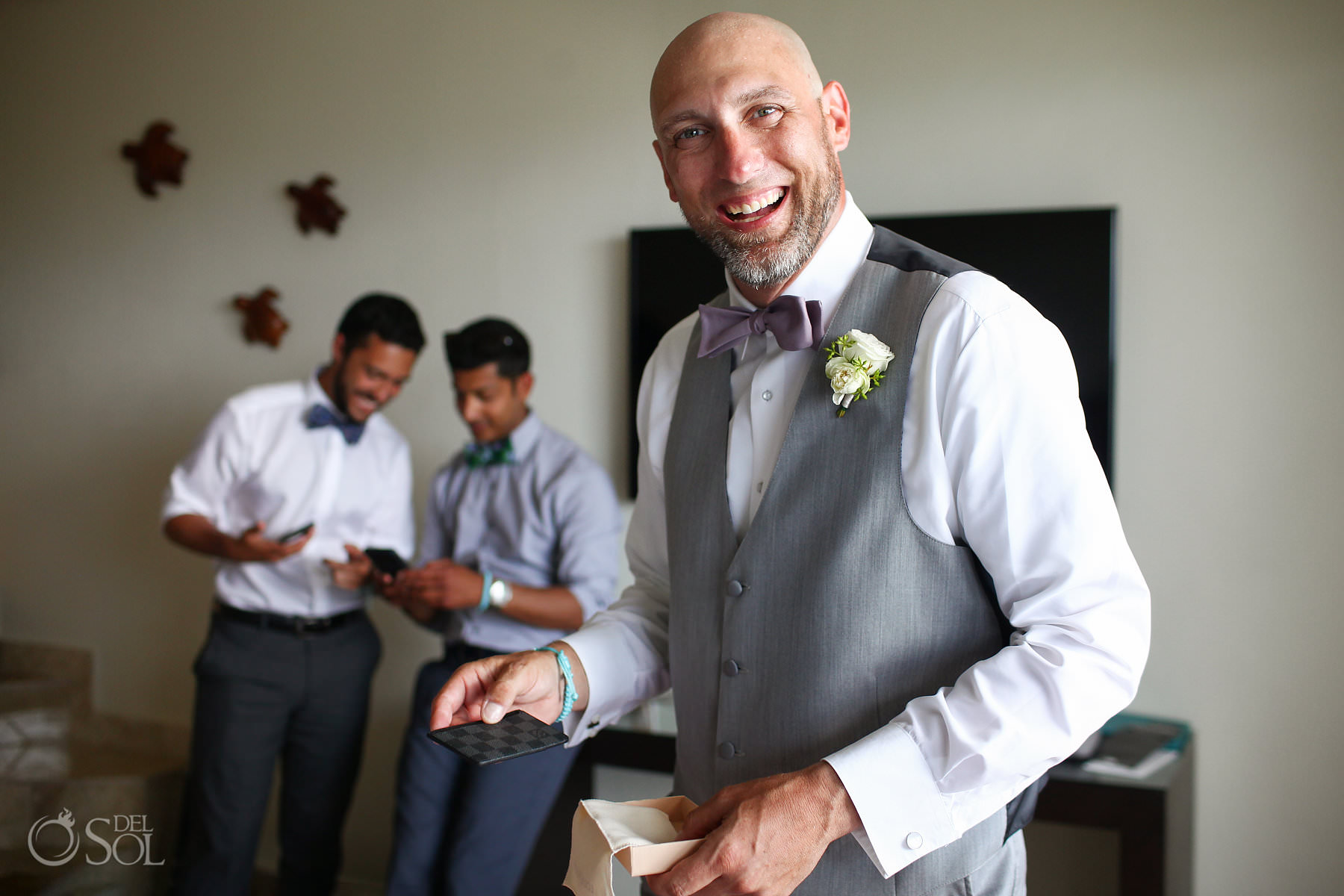 groom opening wedding day gifts Louis Vuitton wallet Akumal Bay Beach and Wellness Resort Wedding