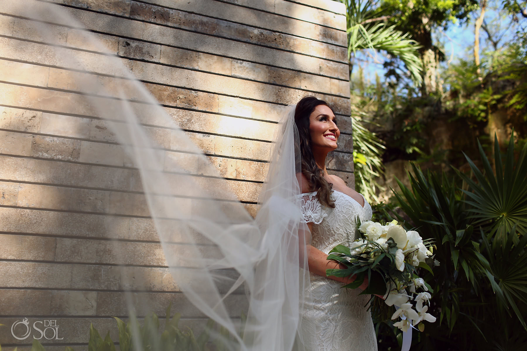 bride wearing boho chic Lillian West wedding dress Xcaret Resort Playa del Carmen Mexico 