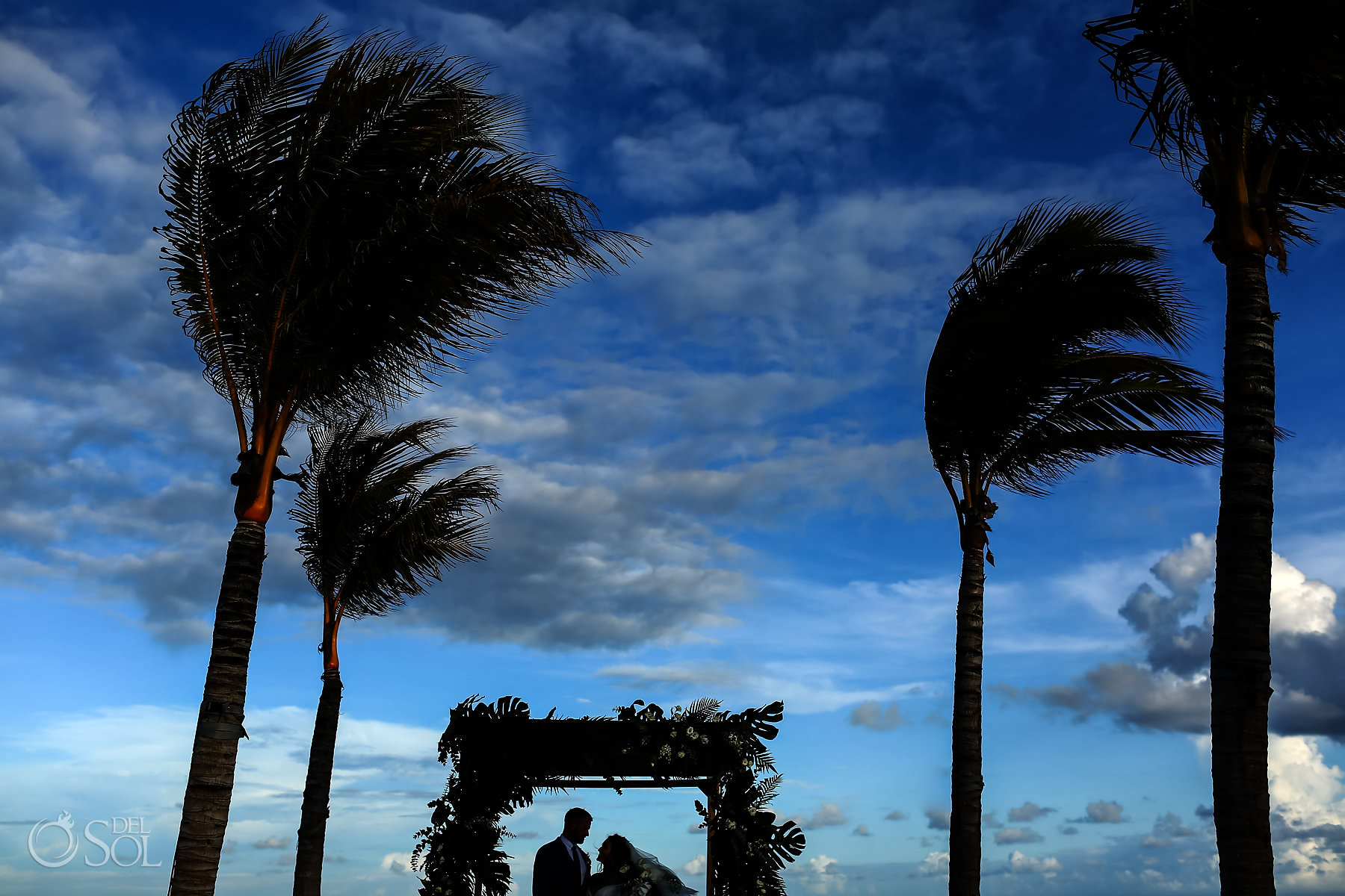 Artistic silhouette beach wedding ceremony Hotel Xcaret Playa del Carmen 