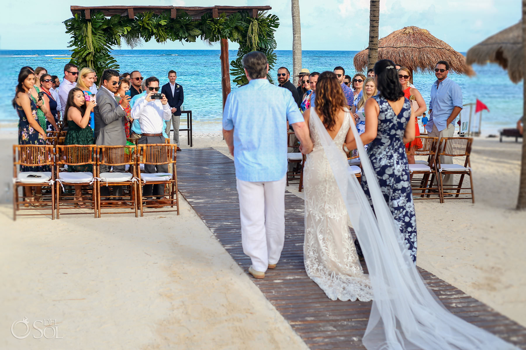 beach destination Wedding bride walking down the isle 