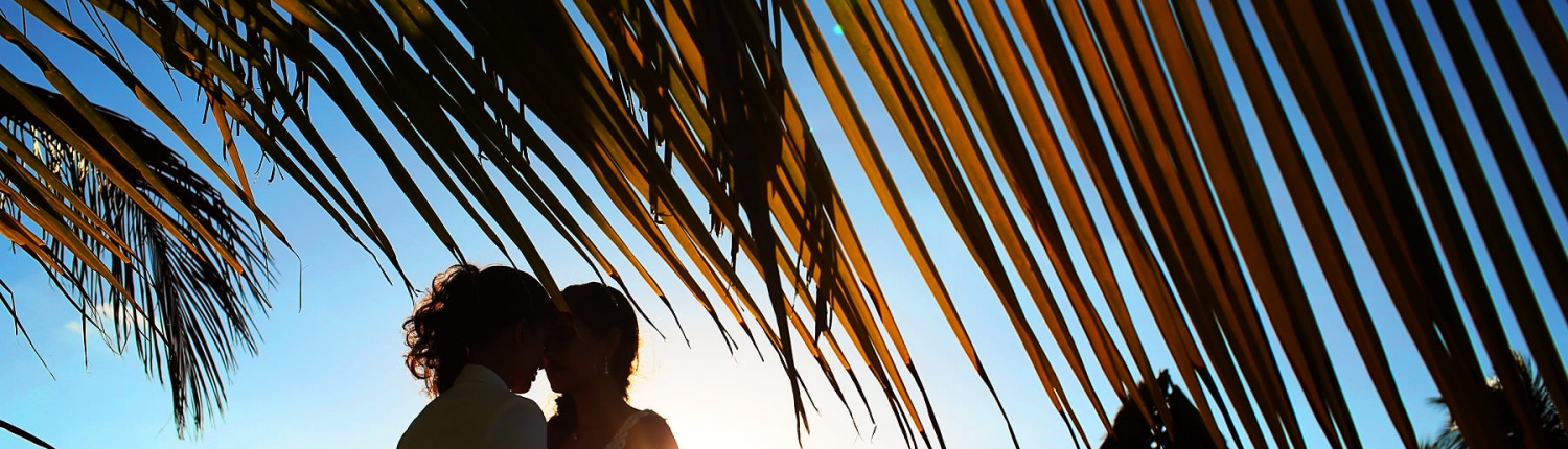 Lesbian couple sunset portraits Mexico Same Sex Wedding Secrets Maroma Beach Riviera Cancun