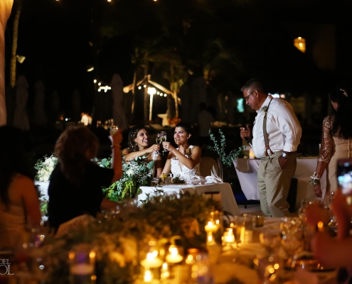 Lesbian Brides toasting Mexico Same Sex Wedding Secrets Maroma Beach Riviera Cancun