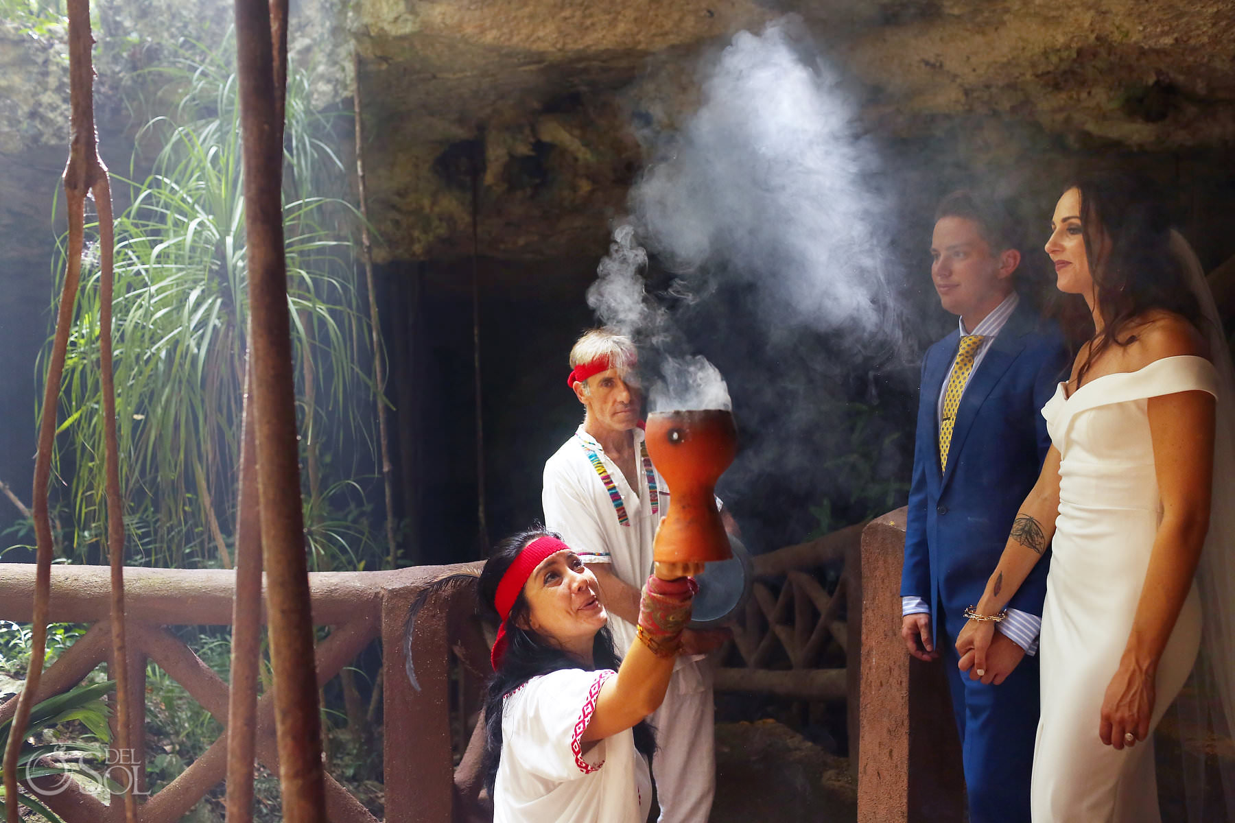 Ceremonial smoke eloping in cenotes in mexico