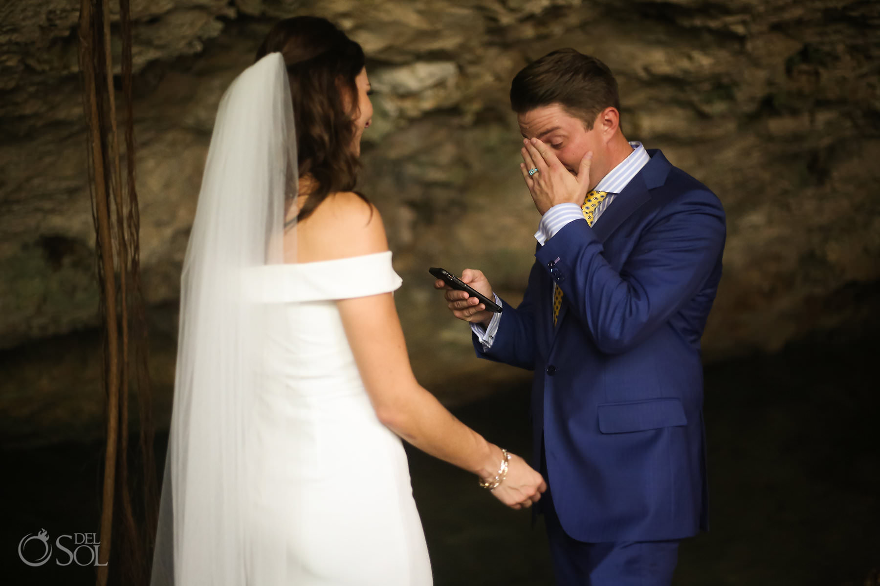 Crying groom during an Elopement ceremony underground in Mexican cenotes