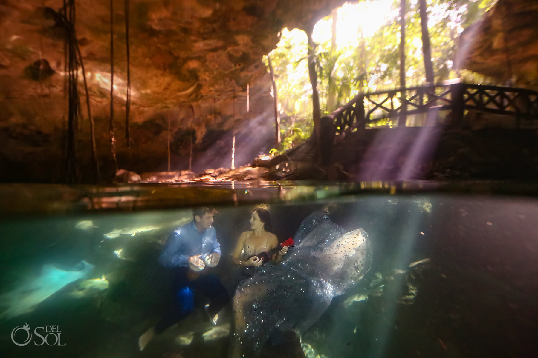 Bride and groom eloping in cenotes in mexico