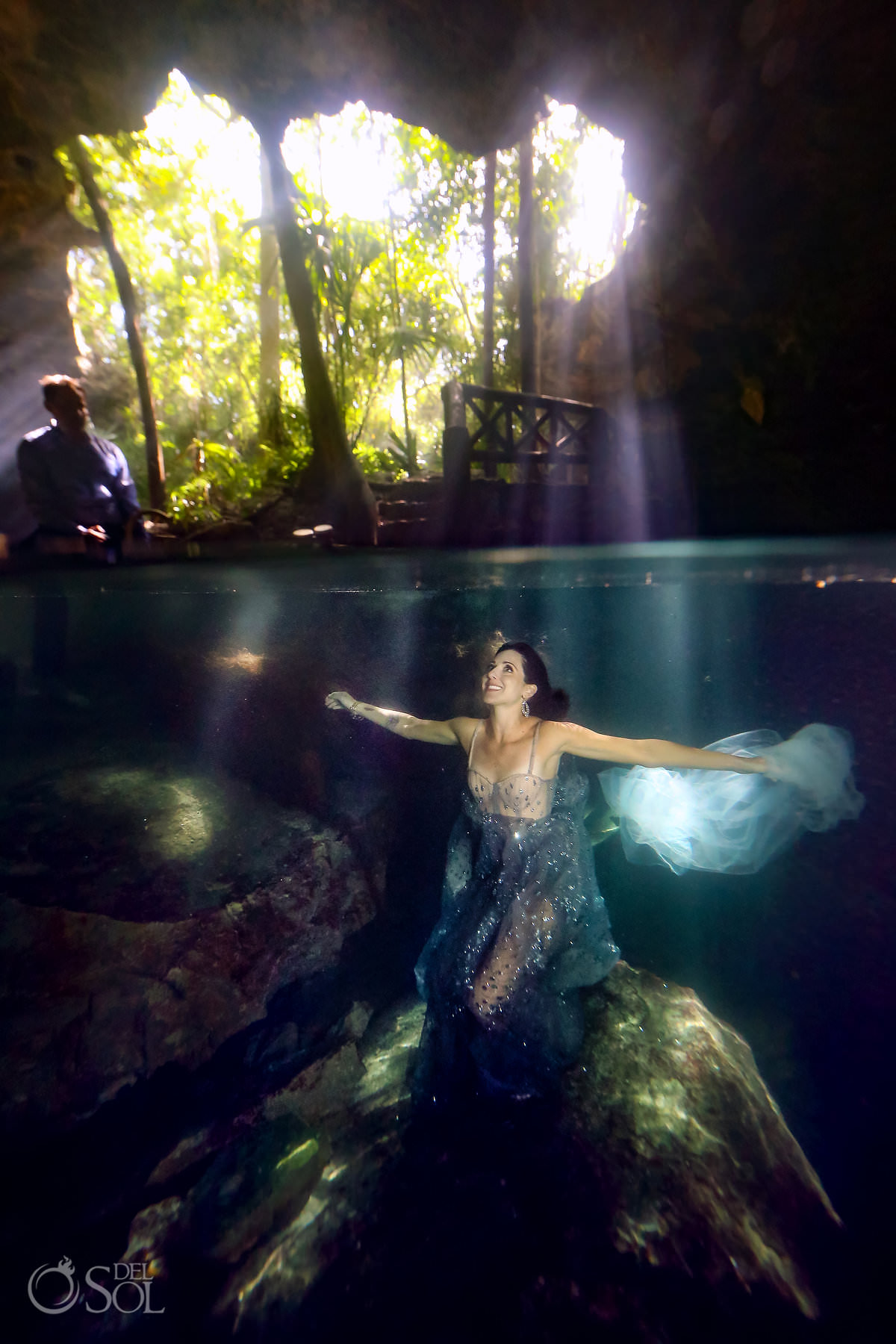 Bride and groom underwater eloping in cenotes in mexico