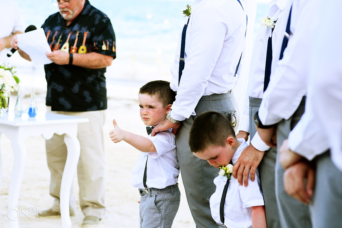 funny wedding photos ringbearer gives thumbs up