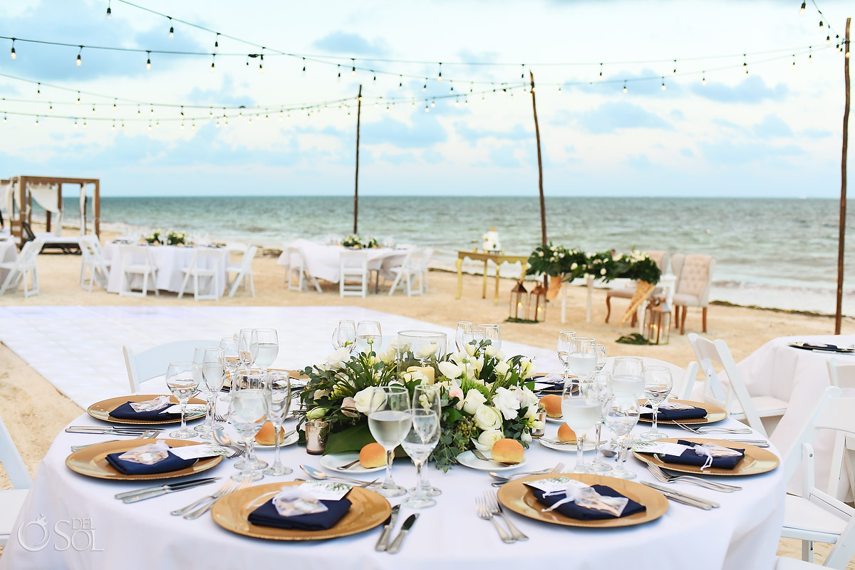 Beach wedding reception setup Dreams Riviera Cancun white contemporary chic