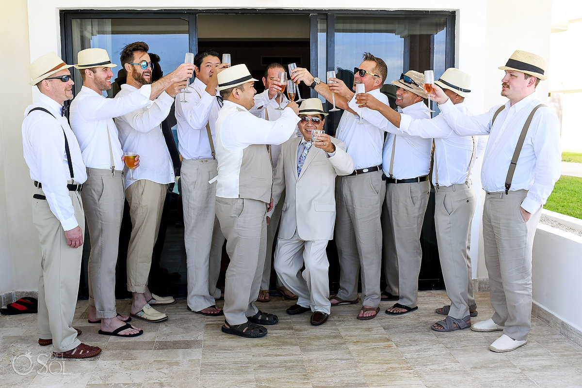 big bridal party groomsmen cheers photo beige linen suits