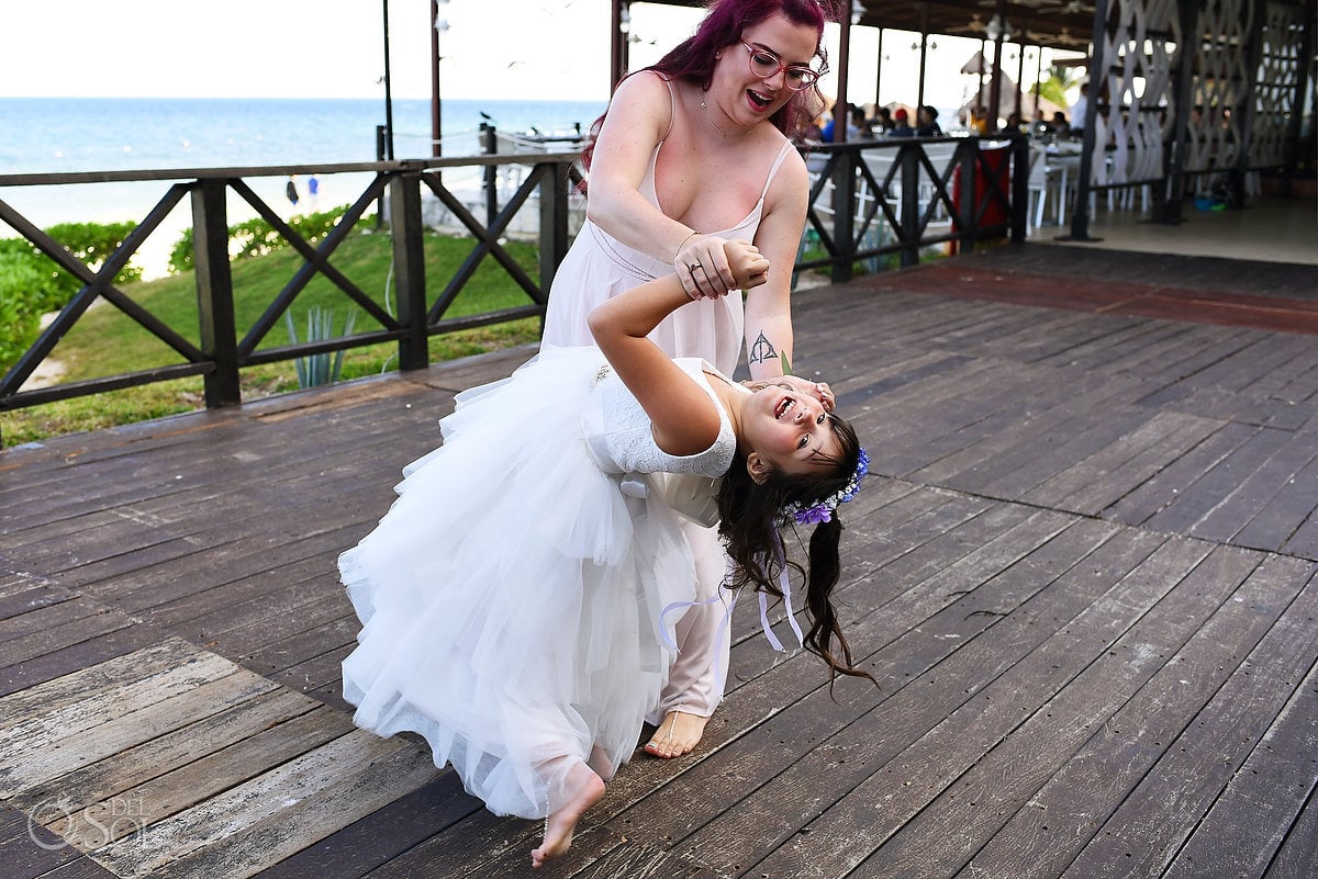 bridesmaids children of bride and groom dancing