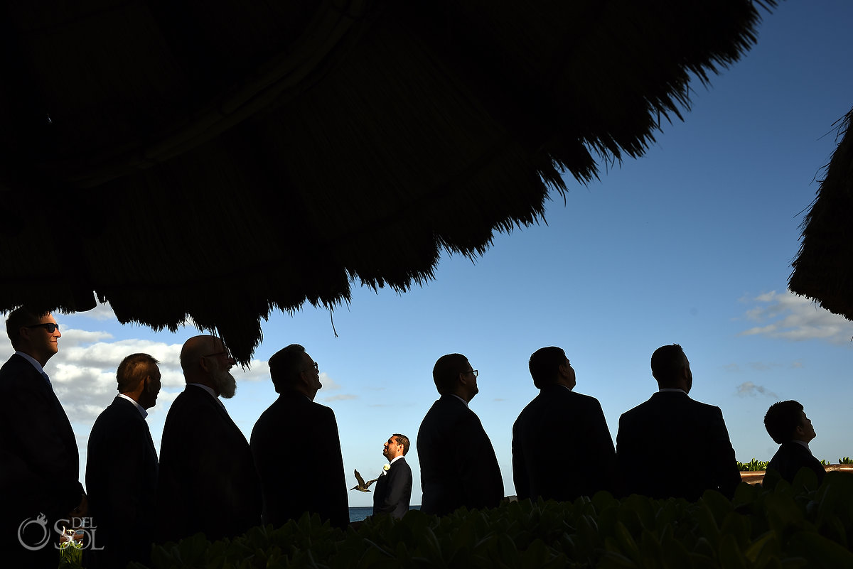 creative bridal party photo groom and groomsmen silhouettes