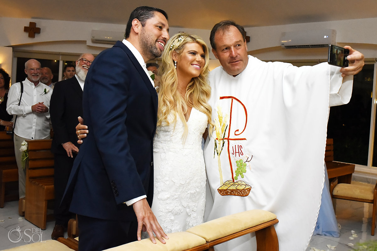 funny Catholic wedding photos priest takes selfie with newleyweds