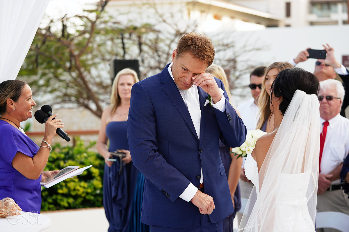 groom wiping tear Secrets Playa Mujeres Wedding