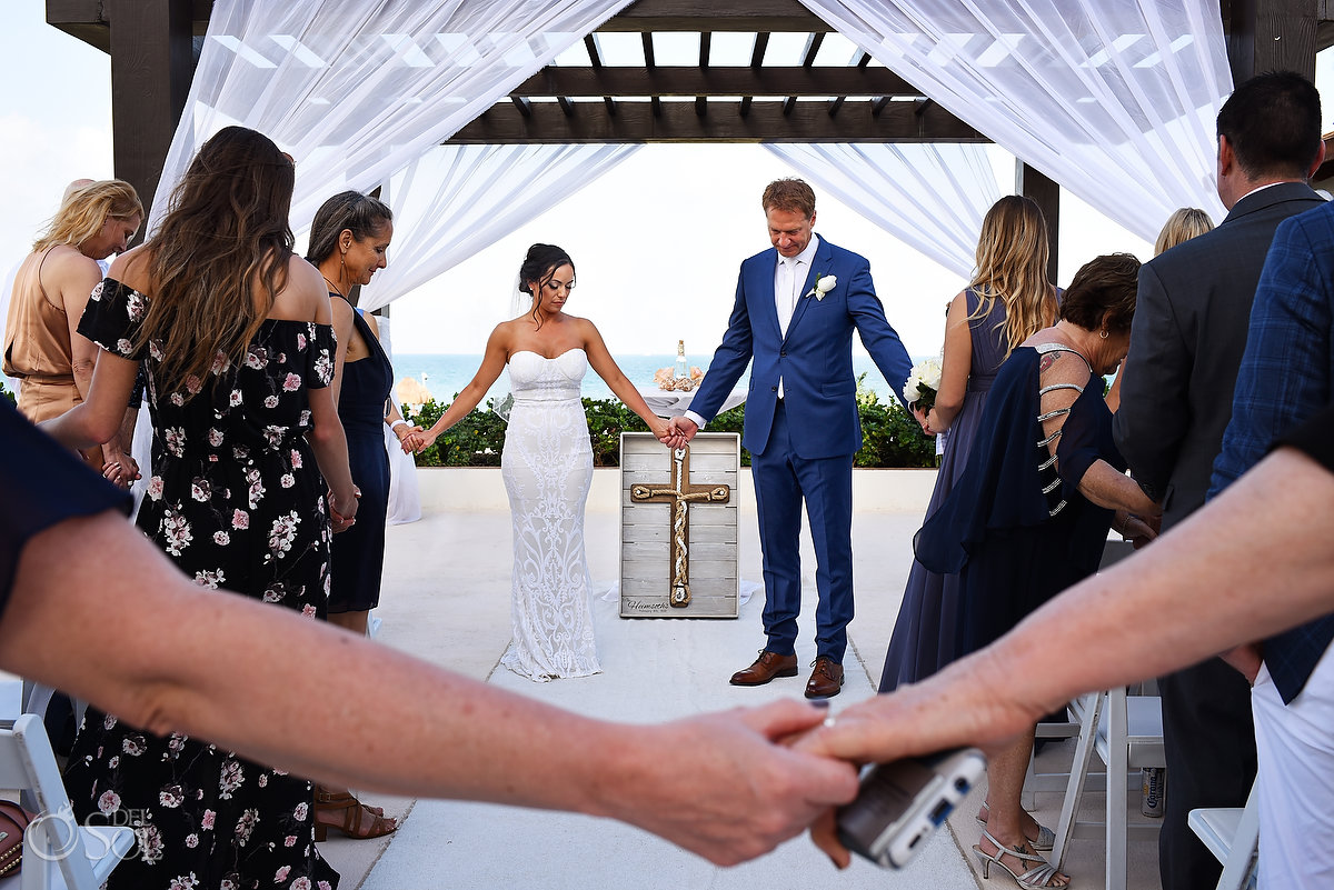 Bride groom and guests join hands in prayer ceremony ideas Secrets Playa Mujeres