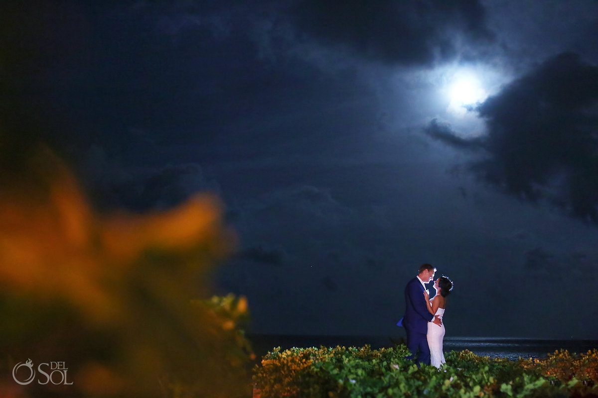 Bride and groom moonlight portrait